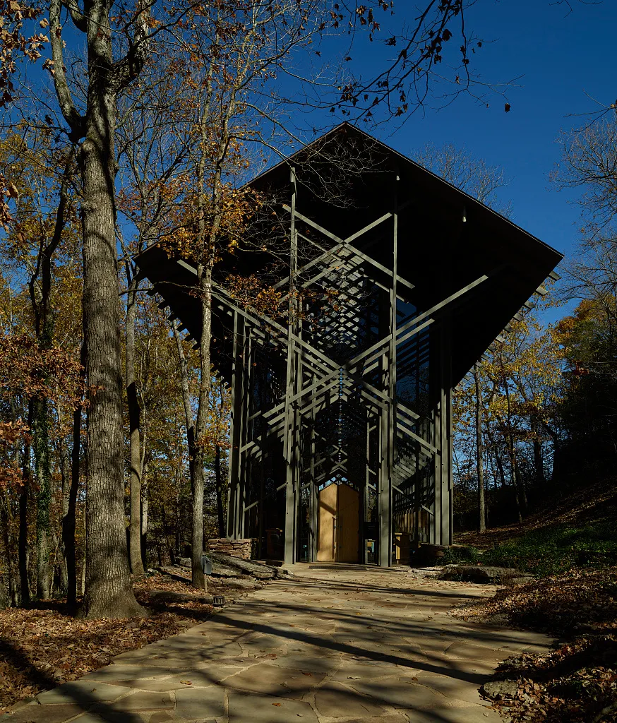 Thorncrown Chapel in Eureka Springs beneath golden autumn foliage
